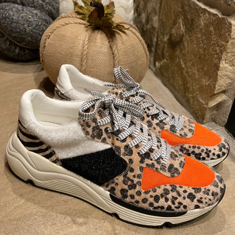 Like new fun and edgy sneakers!!